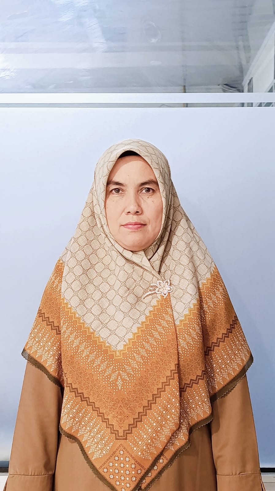 <center>Guru Ekonomi <br>Adila Yusanti, S.Pd</center>
